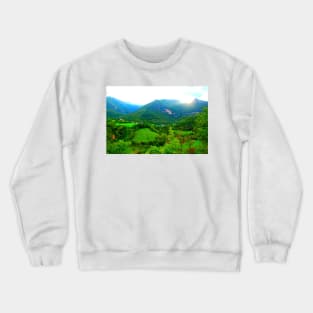 View from Sarnano at the Sibillini Mountains, hills, cattle, buildings Crewneck Sweatshirt